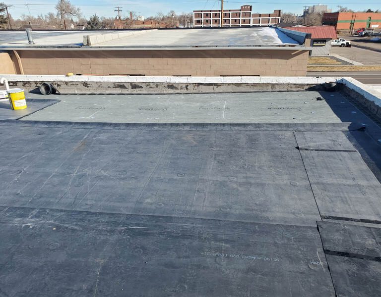 Commercial roofing contractor in Brighton Colorado flat roof replacement