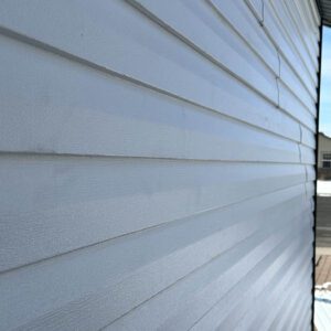 vinyl siding installation in white by Custom Exteriors, a northern Colorado Siding replacement company