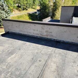 Commercial roof replacement by Custom Exteriors, flat roof