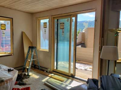 Mulit-family community window and patio door replacements by Custom Exteriors