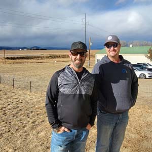 Mike and John, the owners of Custom Exteriors, on site at our building in Berthoud the day we bought it