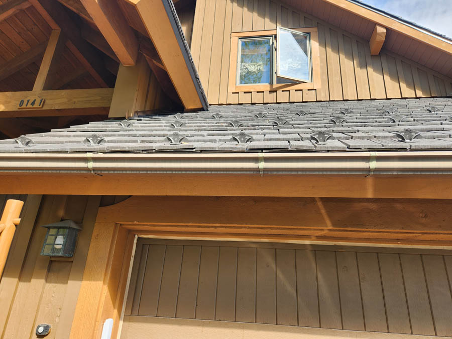 Synthetic shingle roof replacement by Custom Exteriors, a Brush roofing company
