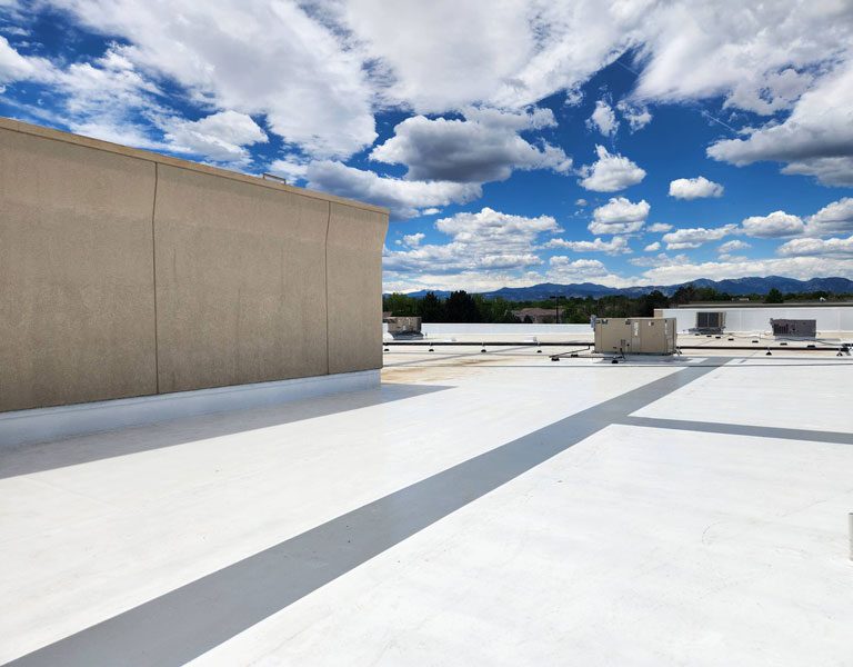 Commercial roof coating completed by Custom Exteriors, a commercial roofing company in Greeley