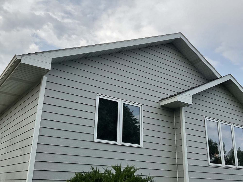 Siding replacement in Greelet y Custom Exteriors